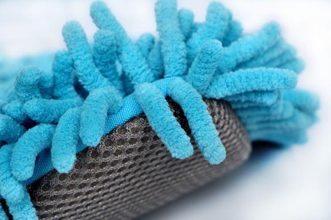 Close-up of chenille and mesh glove surfaces