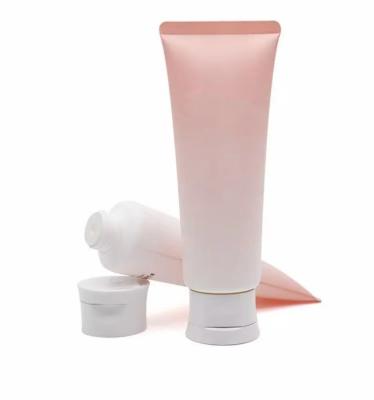 China Empty Cosmetic Transparent Plastic Tube Flip Top Cap Face Wash Cream Soft Tube for sale