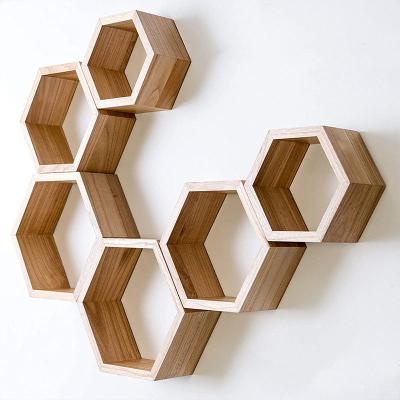 China Estante de almacenamiento Estante de pared hexagonal decorativo de madera en venta