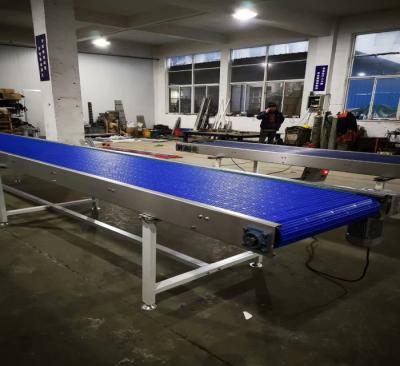 China Blue Plastic Auto Conveyor Systems Adjustable Speed In Logistics And Cosmetics Industry for sale