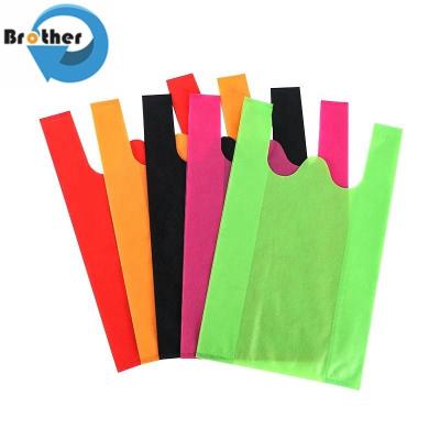 China Free Stock Samples PP Non Woven T-Shirt Tote Eco Friendly Degradable Promotional Shopping Bag Non Woven Bags for sale