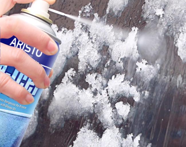 De Icer Spray in use on car windshield