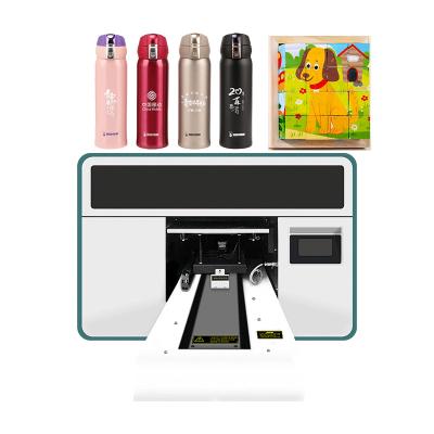 China Impressora de jato de tinta A3 UV Máquina de impressão híbrida UV LED para impressão de vidro com caneta acrílica à venda