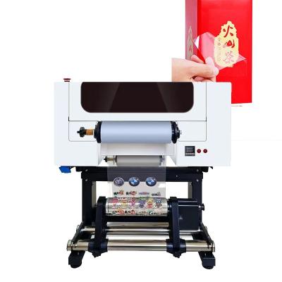 China 30cm UV DTF Printer Roll to Roll Pet Film UV DTF Printer With Two Heads for sale