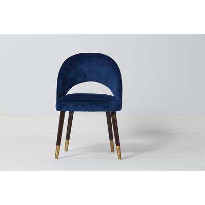 China Tela de Concreted Blue Velvet de la moda que cena sillas con madera sólida y pies metálicos en venta