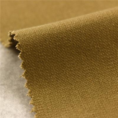 China tela de la lona del poliéster 269gsm/material de color caqui de la lona de la prenda impermeable para las tiendas en venta
