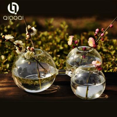 China China Gold Supplier Creative round transparent conjoined 2 in 1 glass vase at bottom price for sale