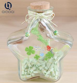 China 610ml Lucky Star Wishing Glass Bottles with special pattern for sale