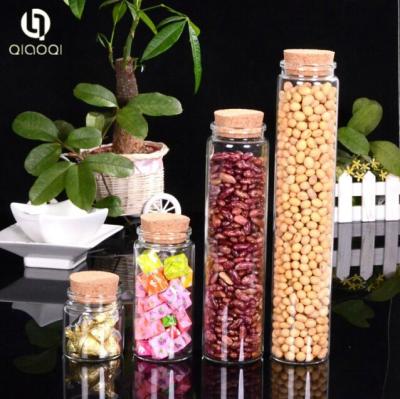 China 90ml 230ml 465ml 580ml tube glass storge bottle with cork for sale