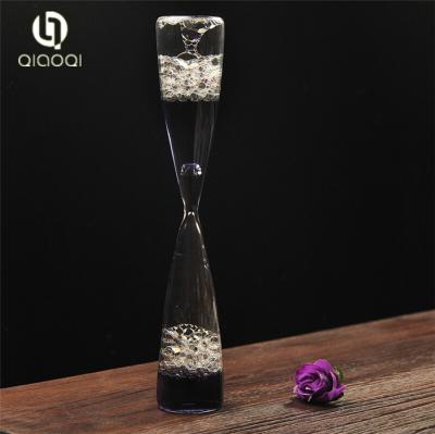 China handmade blown hot selling Oil liquid sand timer birthday gift for sale