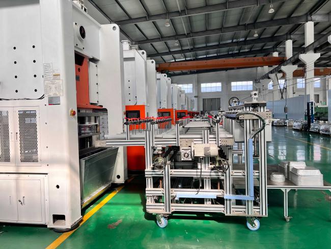Production equipment layout in organized factory space