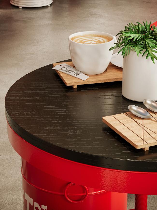 Close-up view of wrought iron oil drum furniture with premium upholstery