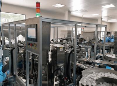 China Máquina de montagem de tampa de infusão Máquina de captura automática com sistema de controle PLC à venda