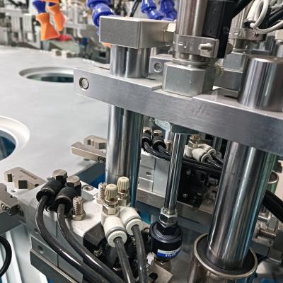 China Capa de desinfección Máquina automática de tapón de botellas Material de acero inoxidable OEM en venta