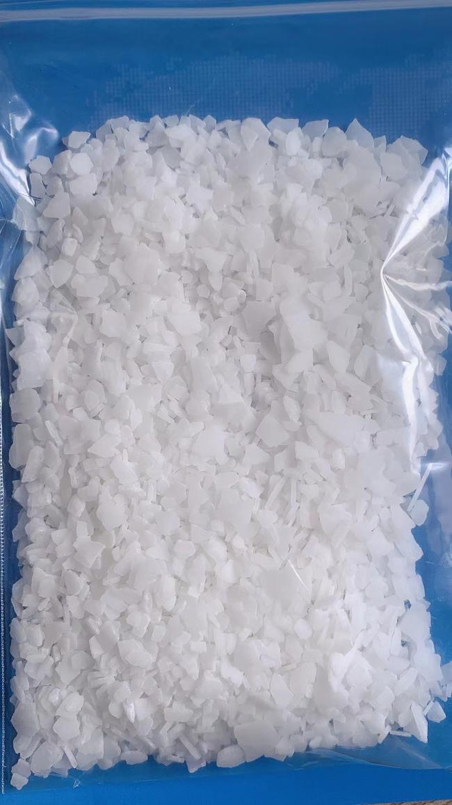 Magnesium chloride flakes sample close-up view