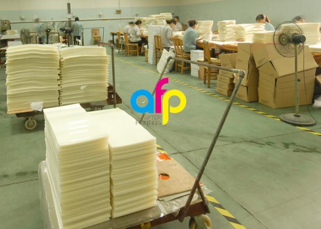 Pouch laminating film application process