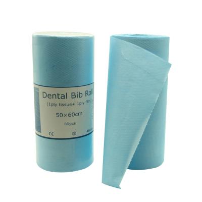 China Productos consumibles dentales del babero del delantal dental impermeable dental disponible paciente del rollo en venta