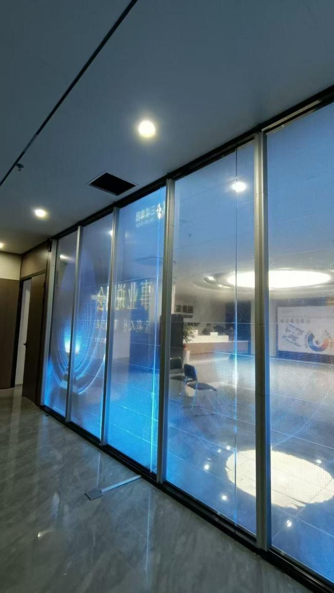 Flexible transparent LED film display in retail environment