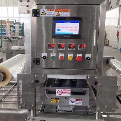 China Automated Tray Sealing Lunch Packing Machine With Optional Vacuum System for sale