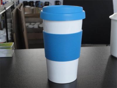 China 400 ml porcelain travel coffee mug with silicone lid and band for sale