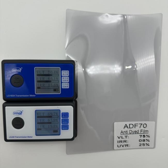 Close-up of ADF70 window film application on car window