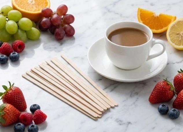 Wood coffee stir sticks used in cafe coffee cup