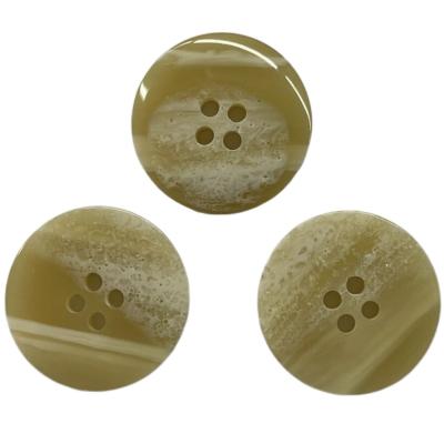 China El botón de mármol falso Brown 30L del poliéster de 4 agujeros utiliza para la chaqueta de la capa en venta