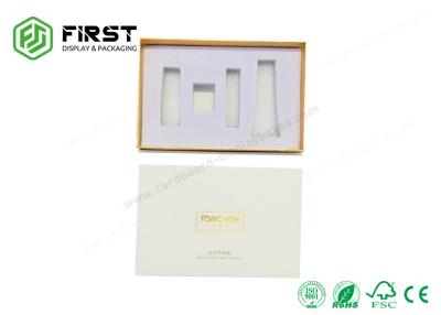 China Cajas de regalo de gama alta de papel de encargo fijadas, caja rígida de los cosméticos que empaqueta con la tapa en venta