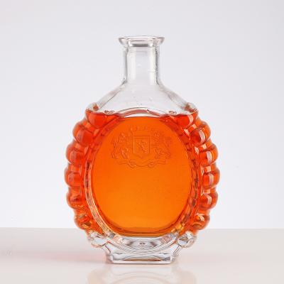 China Hot Stamping 500ML Ultra Clear Brandy Glass Bottle With Embossed Logo for sale