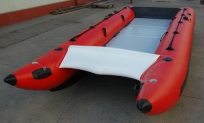 China Red Hand Crafted High Speed Inflatable Boats Racing Catamaran Boat With 450cm Length for sale