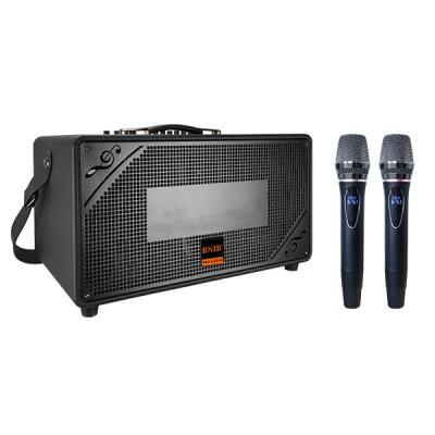China Máquina de Karaoke portátil de 1000 watts Bluetooth Porta-vozes Conexão USB de madeira à venda