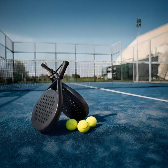 Padel racket in professional match setting