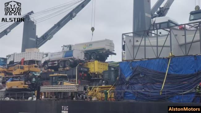 Refurbished HOWO 20,000L oil tanker truck checked before bulk vessel loading