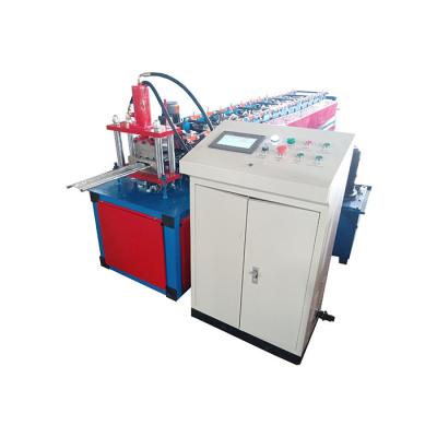 China Steel Sheet Slat Roller Shutter Door Roll Forming Machine Building Material for sale