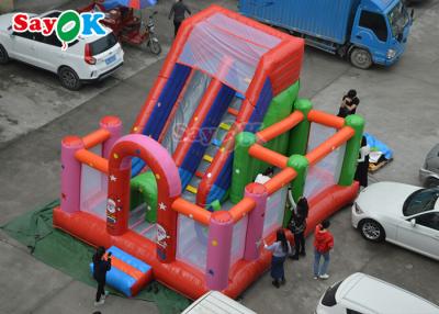 China Barandilla inflada resistente al fuego Casa de salto de salto para perros Castillo de salto para centros de juego en venta
