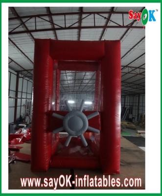 China Dinheiro inflável vermelho da captura da máquina de dinheiro da cabine do dinheiro de Gaint do parque de diversões à venda