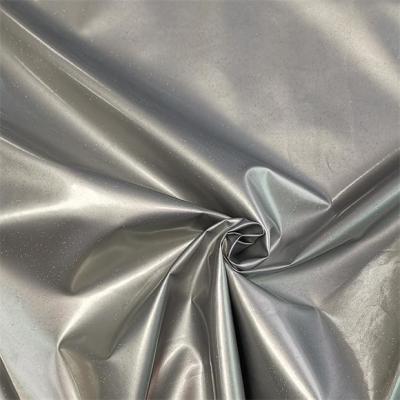 China Shiny Lamination Waterproof Soft Shell Fleece Fabric 75dx75d Stretch for sale