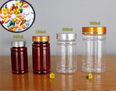 China 100ml 150ml 200ml Amber Plastic Pill Bottles With Cap Transparent for sale