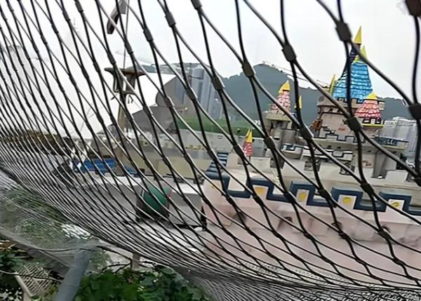 Close-up view of stainless steel cable mesh structure