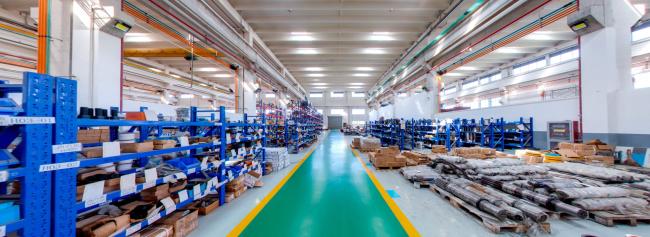 Manufacturing facility overview showing industrial machinery production area