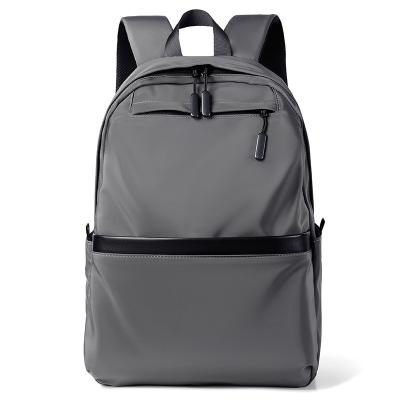 China Unisex Students Bag Backpack Zipper Closure grey color Water Resistant for sale