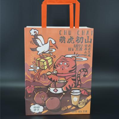 China OEM Personalized Kraft Paper Merchandise Bags With Handles Strong for sale