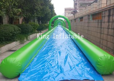 China Diapositiva/tobogán acuático inflables gigantes al aire libre del resbalón N del PVC la diapositiva de la ciudad de la ciudad el 100m para los adultos en venta