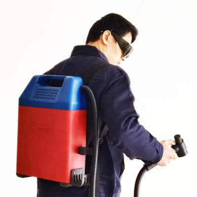 中国 100W バックパック レーザー錆酸化物の塗装コーティング クリーニング マシン 24 ヶ月保証 販売のため