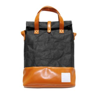 China Custom Kids School Backpack Bags Washable PU Leather Kraft Paper Backpack for sale