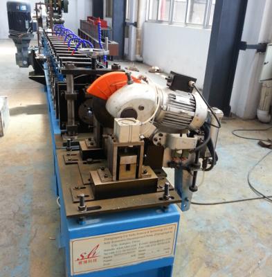 China 1.0'' Single Chain Ceiling Roll Forming Machine With Fly Shear Cutting 0.2-0.5mm for sale