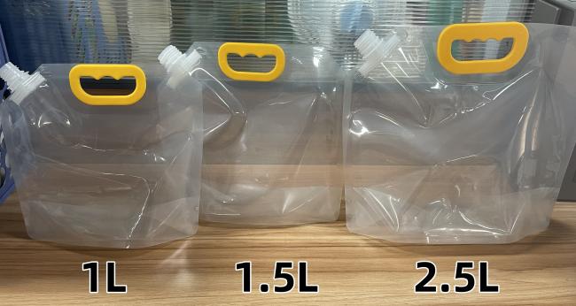 Thickened transparent spout pouch with reinforced handle