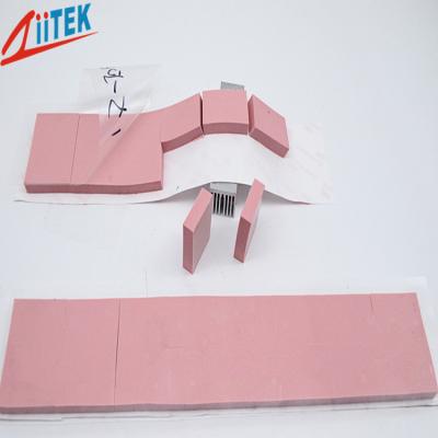 China Pink 3.0W/mK Flexibility Thermal Conductive Pad TIF150-30-49U for Heat Housing at LED-lit 30 shore00, -40 to 160℃ for sale