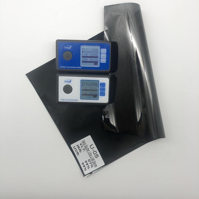 Carbon ceramic window film sample showing light blue tint