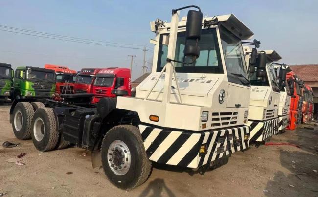 China Yard Jockey/ Yard Spotter/ Hostler/Mule/Terminal Truck for Towing/Hauling Terminal Semi Trailer
